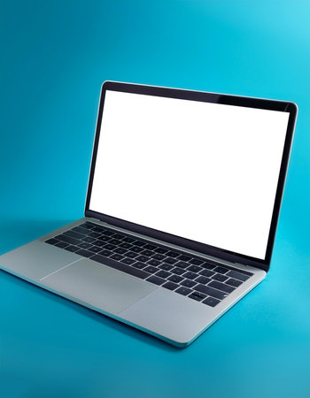 Laptop with bright white screen, background concept isolated on light blue backgroundの写真素材