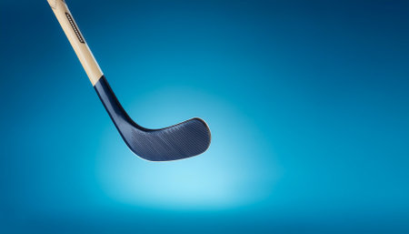 hockey stick floating or flying isolated on light blue backgroundの写真素材