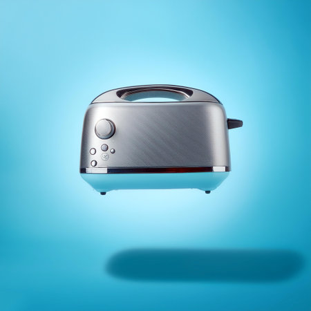 Toaster Machine floating or flying isolated on light blue backgroundの写真素材
