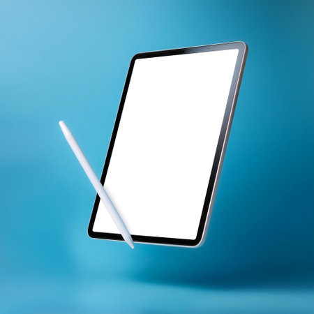 Tablet and stylus with bright white screen floating or flying isolated on light blue background