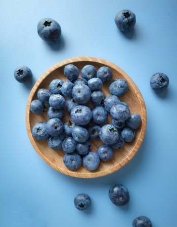 Blueberry, isolated on a pastel blue