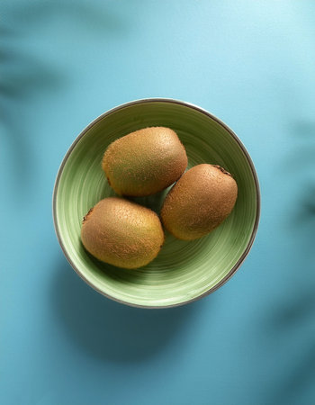 Kiwi, isolated on a pastel blueの写真素材