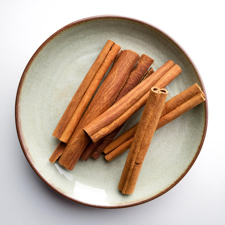 cinnamon sticks, isolated on a white backgroundの写真素材