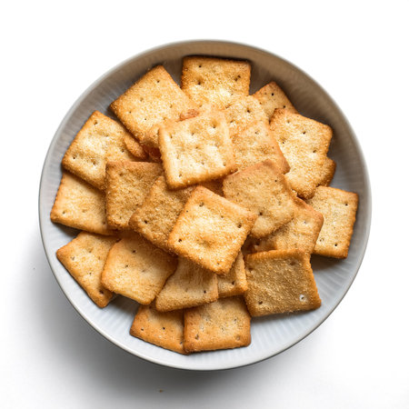 Crushed dry crackers, isolated on a clean white backgroundの写真素材