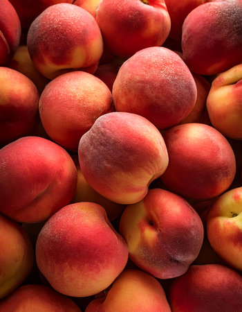 Peach, Creative background design with food theme, focus on the pile of fresh Peachの写真素材