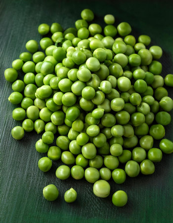 Peas Vegetables, Creative background design with food theme, focus on the pile of fresh Peasの写真素材