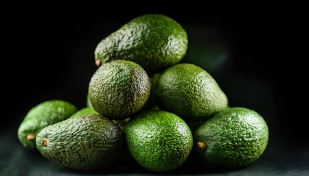 Fresh pile of close-up avocado texture, pattern backgroundの写真素材