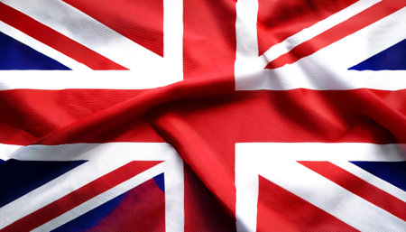 Kingdom of England flag waving in the wind. Kingdom of England blowing, soft and smooth silk. Cloth fabric texture ensign background. Use it for national day and country occasions conceptの写真素材