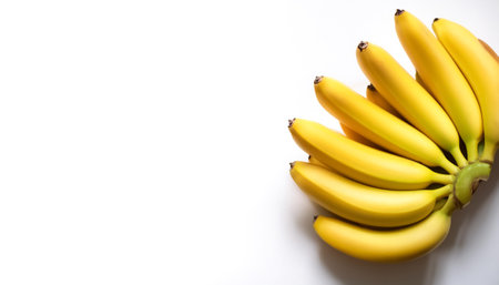 banana fruit pattern on side position provides copy space for text. background concept isolated whiteの写真素材