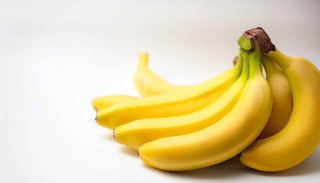 banana fruit pattern on side position provides copy space for text. background concept isolated whiteの写真素材