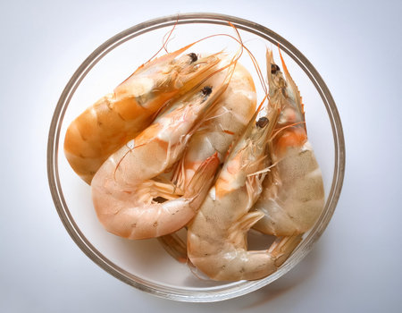 Raw shrimp, isolated on a clean and smooth white backgroundの写真素材