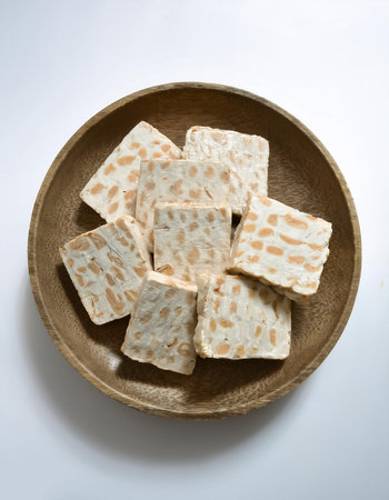 tempeh or tempe, isolated on a clean white background