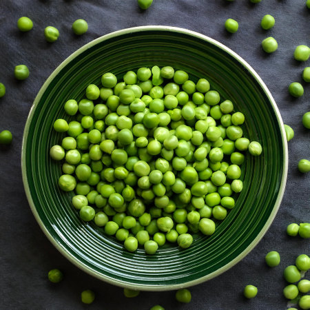 Peas Vegetables, Creative background design with food theme, focus on the pile of fresh Peasの写真素材