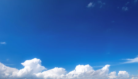 Clear blue sky and white cloudsの写真素材