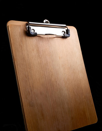 Clipboard, isolated on a dark blackの写真素材