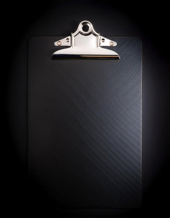 Clipboard, isolated on a dark blackの写真素材