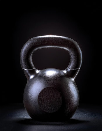 Kettlebell, isolated on a dark blackの写真素材