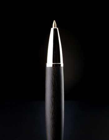 Pen, isolated on a dark blackの写真素材