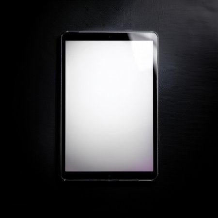 Tablet with white screen, isolated on a dark blackの写真素材
