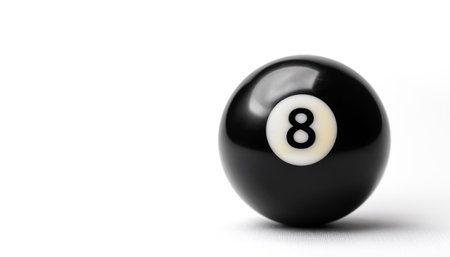 number 8 eight ball, the black ball, used in pool billiard games on side position provides copy space for text. background concept isolated whiteの写真素材