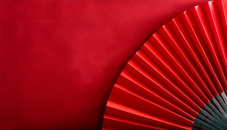 Chinese red fan background concept to celebrate lunar new yearの写真素材