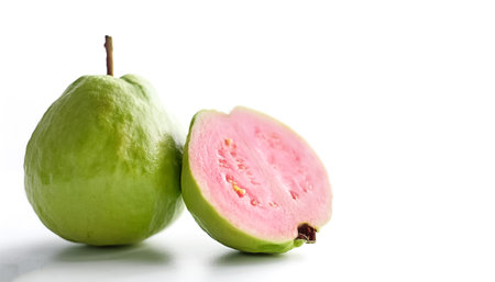 guava fruit on side position provides copy space for text. background concept isolated white