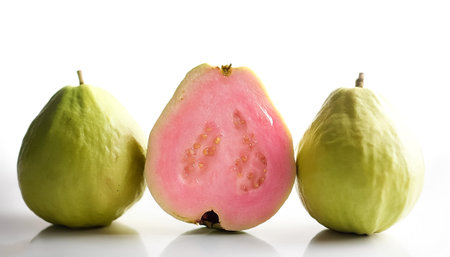 guava fruit on side position provides copy space for text. background concept isolated whiteの写真素材