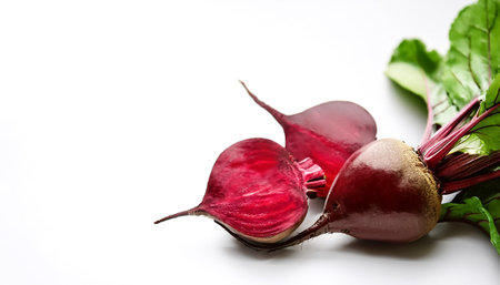 red beets with green leaves pattern on side position provides copy space for text. background...