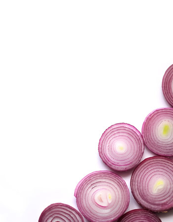 red onion slices pattern with side position provides copy space for text. background concept isolated whiteの写真素材