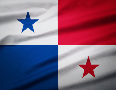Republic of Panama flag waving in the wind. Close up of Republic of Panama flag banner blowing, soft and smooth silk. Cloth fabric texture ensign background. Use it for national day and country occasions conceptの写真素材