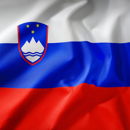 Republic of Slovenia flag waving in the wind. Close up of Republic of Slovenia flag banner blowing, soft and smooth silk. Cloth fabric texture ensign background. Use it for national day and country occasions conceptの写真素材