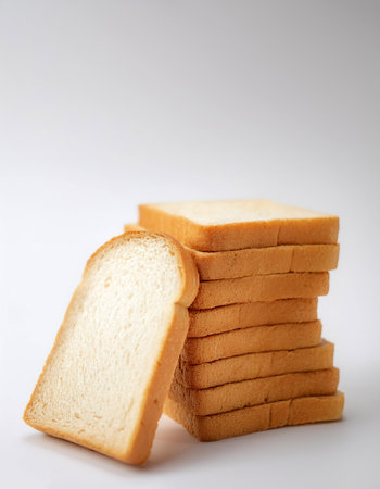 Delicious bread slices on side position provides copy space for text. background concept isolated light white backgroundの写真素材