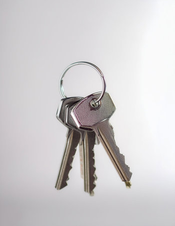 House Keys floating or flying isolated white backgroundの写真素材