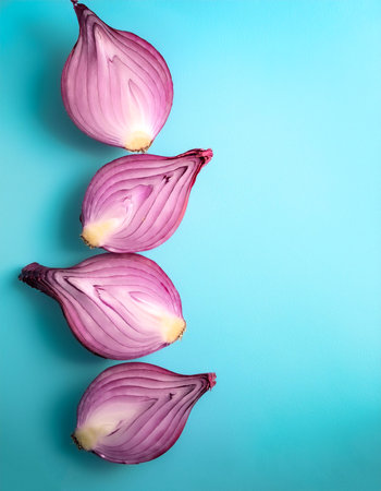 red onion slices. pattern texture on side position provides copy space for text. background concept isolated light blue backgroundの写真素材