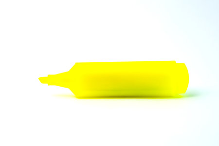 Bright yellow highlighter pen with a chisel tip for smooth, precise marking. Perfect for students, office work, and note-taking. Fast-drying, smudge-proof, and long-lasting ink.の写真素材