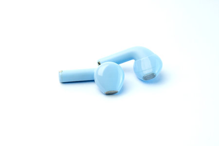 Stylish blue wireless earbuds with an ergonomic fit and high-quality sound. Compact, lightweight, and perfect for music, calls, gaming, and workouts with noise isolation.の写真素材