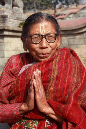 KATHMANDU - FEB 02,2014- An unidentified Hindu pilgrim visit the Pashupathinath temple in Nepal.Pashupathinat h temple is an important Shiva shrine listed in the UNESCO World Heritage Sitesのeditorial素材