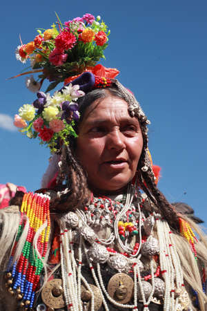 LEH, INDIA - SEPT 01 ,2012- An unidentified Ladakhi tribal woman wearing traditional costumes participates in the cultural procession during Ladakh Festival  in Leh, India.のeditorial素材