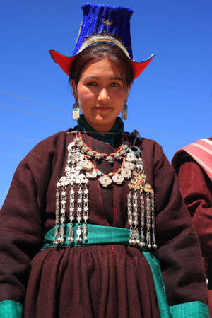 LEH, INDIA - SEPT 01 ,2012- An unidentified Ladakhi tribal woman wearing traditional dress poses as she participates in the cultural procession during Ladakh Festival  in Leh, Indiaのeditorial素材