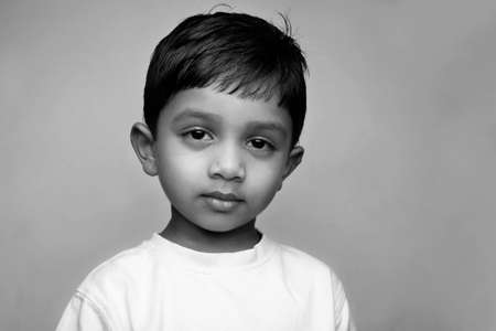 Black and white portrait of a little boyの写真素材