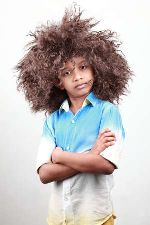 Portrait of a boy with a funky hairstyleの写真素材