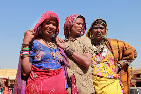 JAISALMER, INDIA - FEB 03, 2015-Unidentified tribal women dressed up in traditional Rajasthani costume and ornaments pose during Desert Festival in  Jaisalmer, Rajasthan, India.のeditorial素材