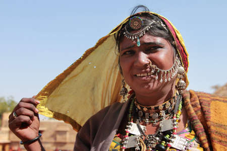 JAISALMER, INDIA - FEB 03,2015-Unidentified tribal woman dressed up in traditional Rajasthani...