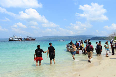 JOLLY BUOY, INDIA - FEB 11,2012-Unidentified tourists spend time in sea water in Jolly Buoy Island, Andamans,India. Jolly Buoy being a plastic free island attracts lots of tourists.のeditorial素材