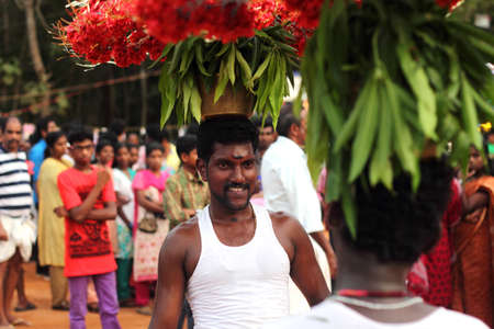 MEZHUVELII, KERALA - MAR 03,2014-Ammankudam artists perform during the Shivaratri festival of Shiva temple in Mezhuveli, Kerala. Ammankudam is a temple dance prevalent in South India.のeditorial素材