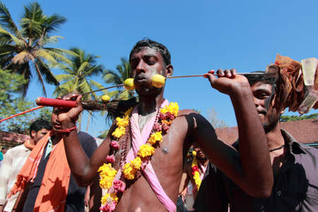 HARIPAD - JAN 27,2013- A cheek pierced devotee participate in the Thaipooyam festival at Subramanian temple in Haripad, India.Thaipooyam festival is devoted to Lord Murugan in India.のeditorial素材