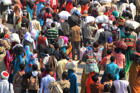 ALLAHABAD - FEB 09,2013-Devotees taking holy dip in the river Ganges during the Kumbh Mela  in Allahabad, India. Kumbh Mela is considered as the largest human gathering in the world.のeditorial素材