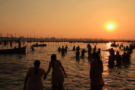 ALLAHABAD - FEB 08,2013-Devotees taking holy dip in the river Ganges during the Kumbh Mela  in Allahabad, India. Kumbh Mela is considered as the largest human gathering in the world.のeditorial素材