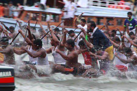 CHAMPAKKULAM, INDIA - JUNE 23,2013-Leading snake boat teams competing in the Champakkulam Moolam Boat race held in Champakkulam, Kerala, India.のeditorial素材