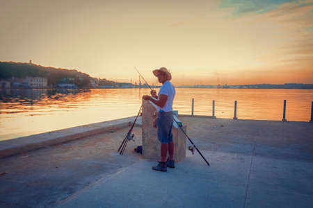People are fishing at the Malecon Road road in the city of Havana on Cuba in the caribbean sea....